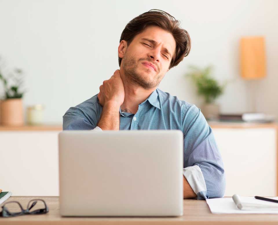 a man is in need of a chiropractor for neck pain