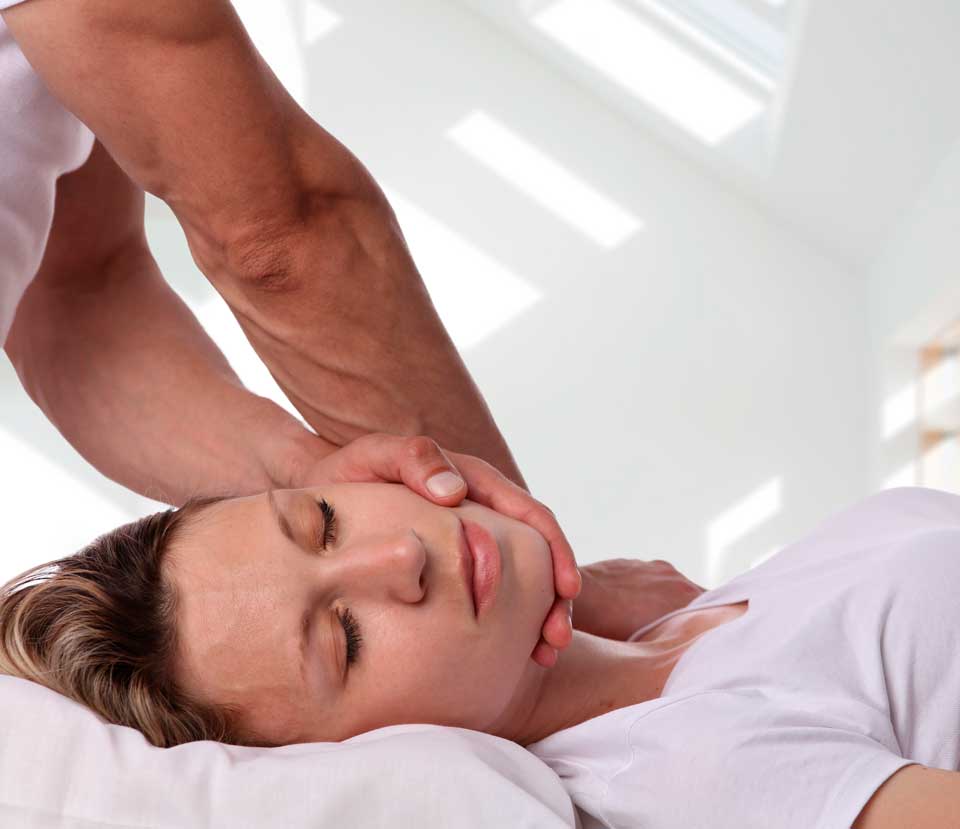 Crystal Lake Expert Whiplash Treatment a chiropractor is performing a whiplash treatment